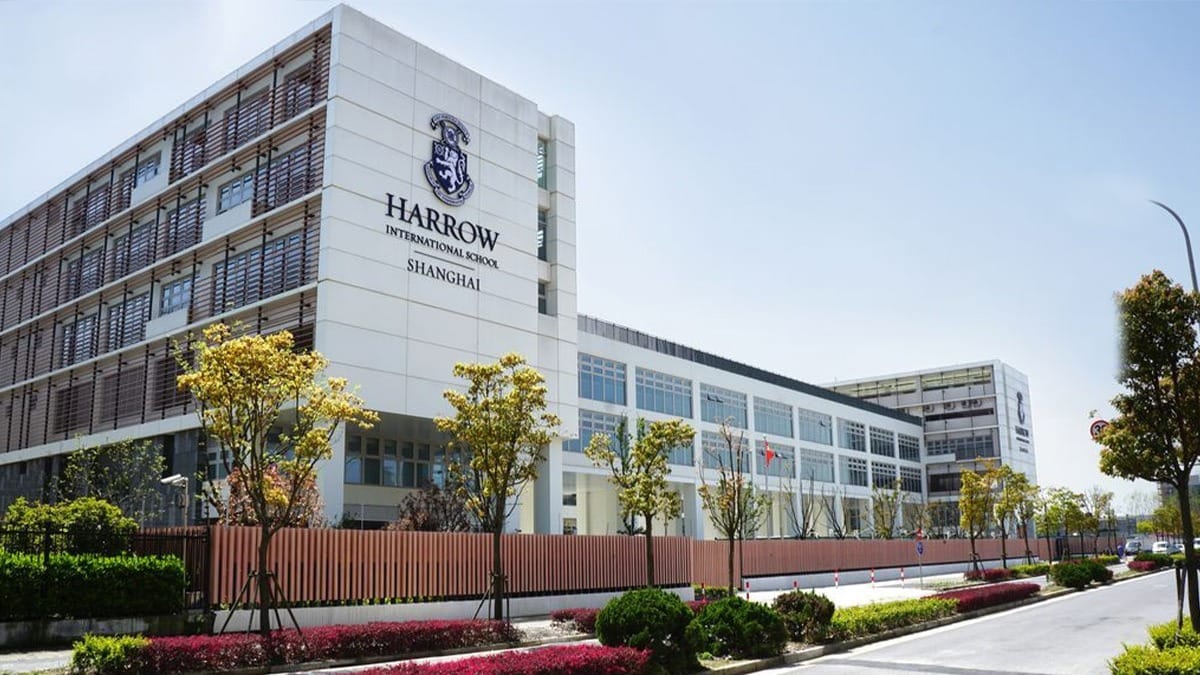 Harrow International School Shanghai modern campus building with crest and landscaped grounds