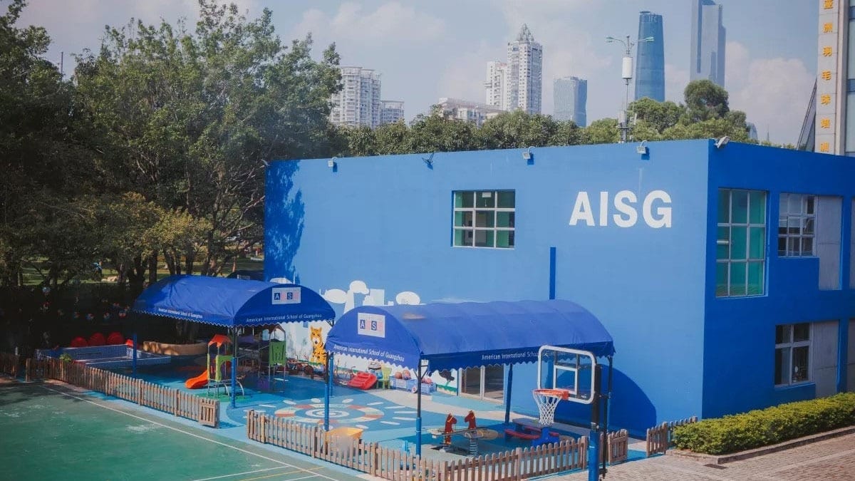 American International School of Guangzhou blue facility with outdoor play area